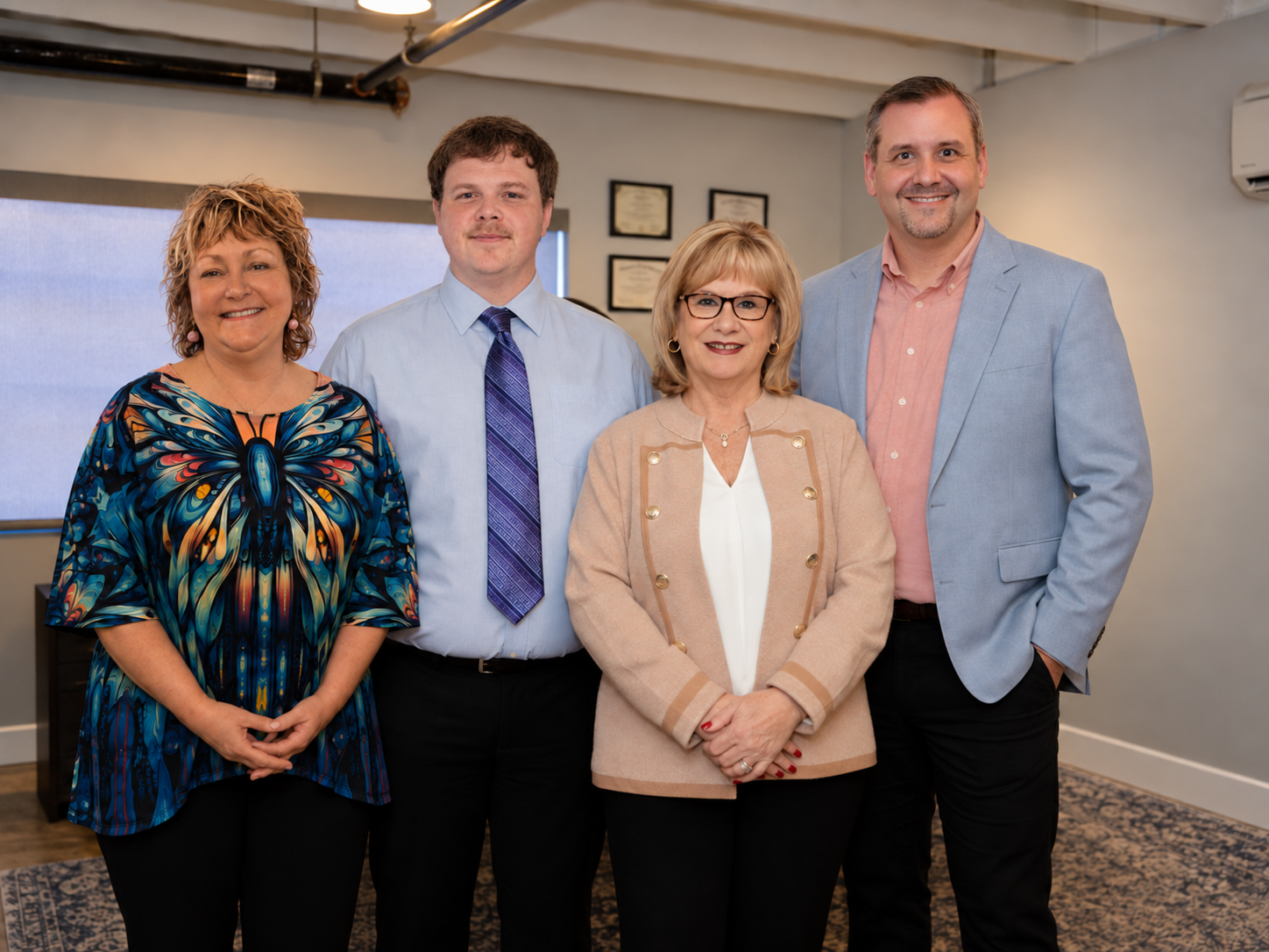 Couture Ledger Group team: Lisa Howard, Tyler Vaughn, Susie Couture, and Chris Couture
